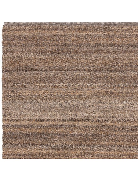 Elevate your space with the Abbus Tawny Brown boho rug—handwoven texture, durable polyester, and warm earthy tones for cozy, st