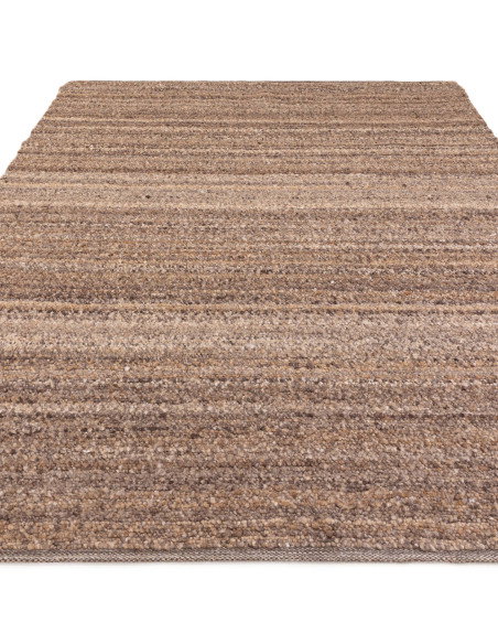 Elevate your space with the Abbus Tawny Brown boho rug—handwoven texture, durable polyester, and warm earthy tones for cozy, st