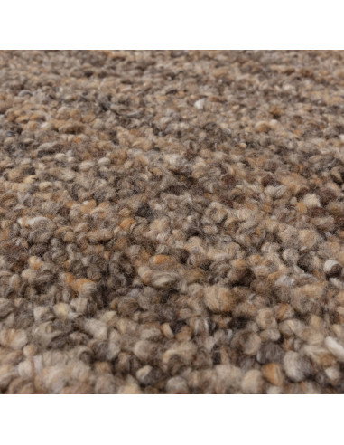 Elevate your space with the Abbus Tawny Brown boho rug—handwoven texture, durable polyester, and warm earthy tones for cozy, st