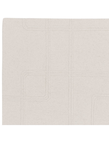 Elevate your space with the Ada Ivory boho rug, featuring a soft geometric design and natural wool for lasting comfort and time