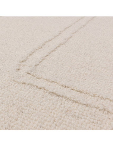 Elevate your space with the Ada Ivory boho rug, featuring a soft geometric design and natural wool for lasting comfort and time