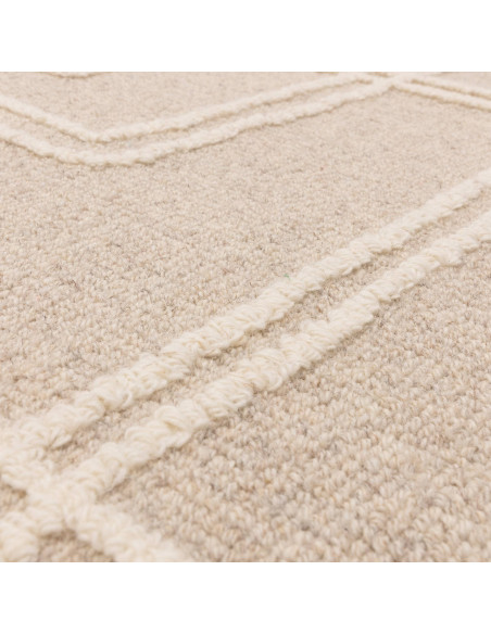 Elevate your space with the Ada Sand boho rug, featuring a soft geometric design and natural wool for timeless style and cozy c