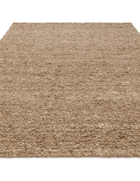 Tappeto Adler Honey in lana naturale, stile boho chic, morbido e artigianale, perfetto per ambienti caldi e accoglienti.