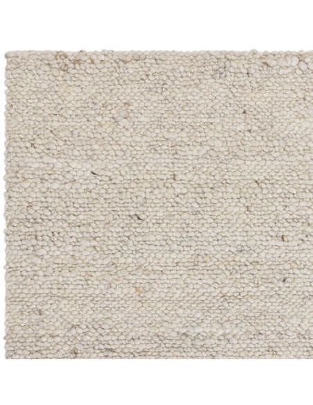 Tappeto Adler Ivory in lana naturale, perfetto per ambienti boho chic ed etnici, unisce eleganza, comfort e design versatile.