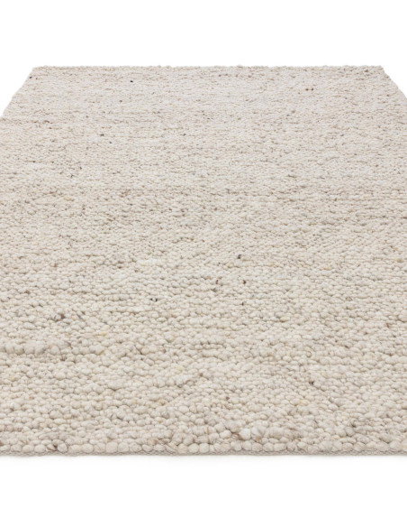Elevate your space with the Adler Ivory boho rug, featuring handwoven natural wool for plush comfort and timeless bohemian styl