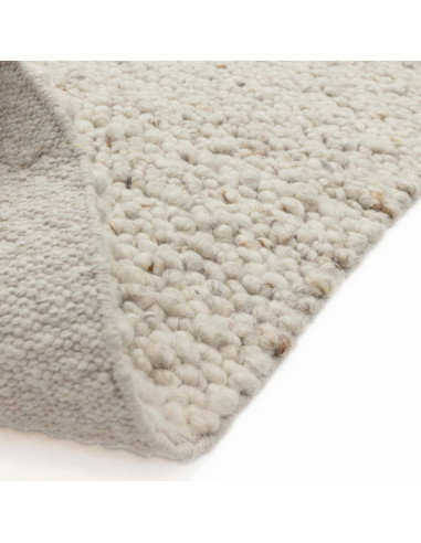 Elevate your space with the Adler Ivory boho rug, featuring handwoven natural wool for plush comfort and timeless bohemian styl