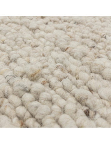 Elevate your space with the Adler Ivory boho rug, featuring handwoven natural wool for plush comfort and timeless bohemian styl