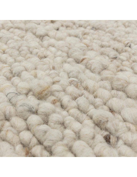 Elevate your space with the Adler Ivory boho rug, featuring handwoven natural wool for plush comfort and timeless bohemian styl