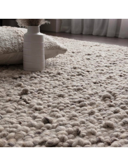 Elevate your space with the Adler Silver boho rug, featuring natural wool texture, handcrafted quality, and a versatile silver