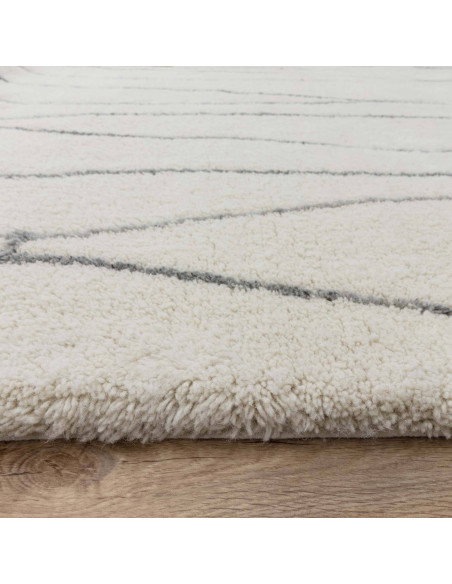 Handcrafted natural wool boho rug with elegant geometric design, plush texture, and durable comfort—perfect for stylish, cozy l