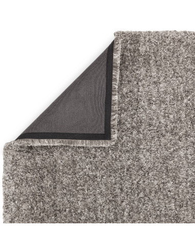 Add cozy elegance to your space with the Barnaby Grey boho rug, featuring plush hand-made texture and durable, easy-care microf