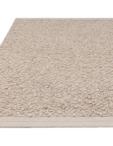 Elevate your space with the Elm Taupe boho rug, handcrafted from natural wool and viscose for timeless style and cozy comfort.