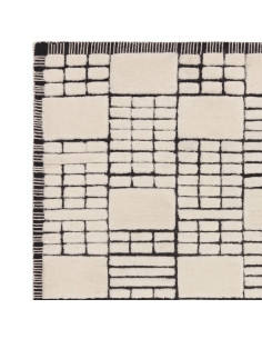 Elevate your space with the Empire Cream/Black boho rug, featuring a modern geometric design and soft, durable natural wool for 2