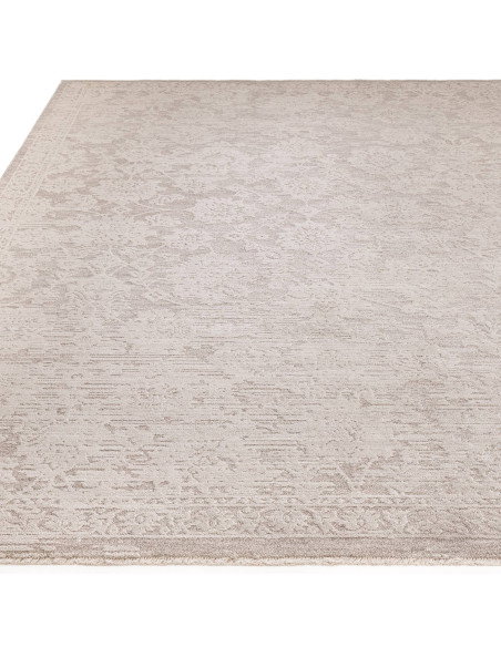 Elevate your space with the Laurent LA04 beige boho rug, featuring a subtle abstract design and durable, easy-care polyester fi