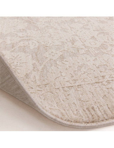 Elevate your space with the Laurent LA04 beige boho rug, featuring a subtle abstract design and durable, easy-care polyester fi