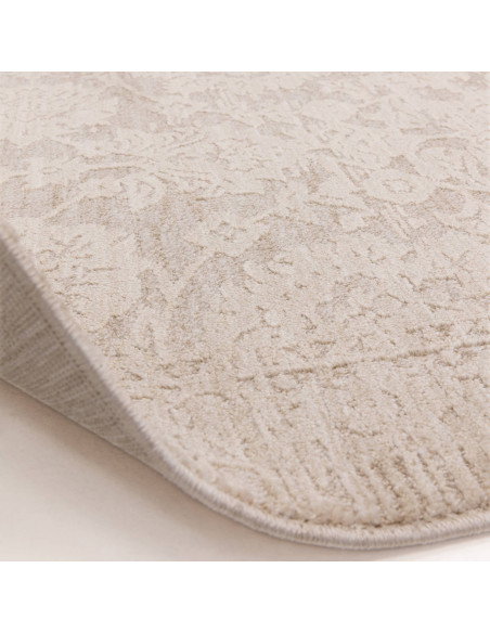 Elevate your space with the Laurent LA04 beige boho rug, featuring a subtle abstract design and durable, easy-care polyester fi