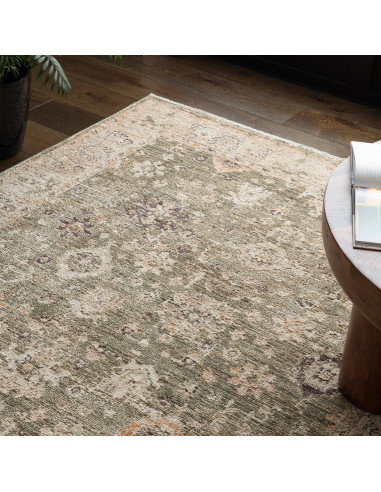 Elevate your space with the Heriz Ornate Green classic rug, featuring a timeless medallion pattern and durable, easy-care polye
