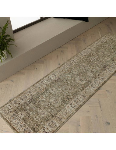 Elevate your space with the Heriz Ornate Green classic rug, featuring a timeless medallion pattern and durable, easy-care polye