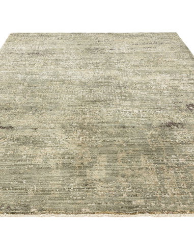 Elevate your space with the Heriz Patina Green rug, a classic rug featuring a medallion pattern and durable, easy-care syntheti