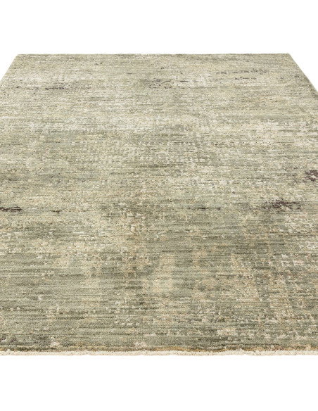 Elevate your space with the Heriz Patina Green rug, a classic rug featuring a medallion pattern and durable, easy-care syntheti