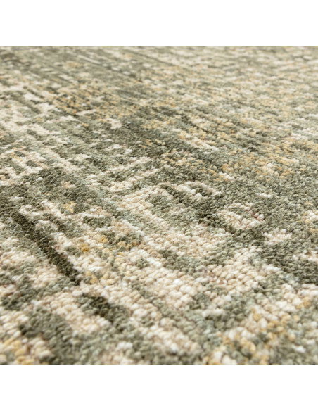 Elevate your space with the Heriz Patina Green rug, a classic rug featuring a medallion pattern and durable, easy-care syntheti