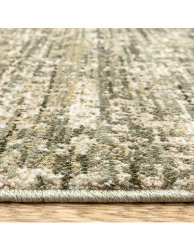 Elevate your space with the Heriz Patina Green rug, a classic rug featuring a medallion pattern and durable, easy-care syntheti