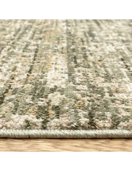 Elevate your space with the Heriz Patina Green rug, a classic rug featuring a medallion pattern and durable, easy-care syntheti
