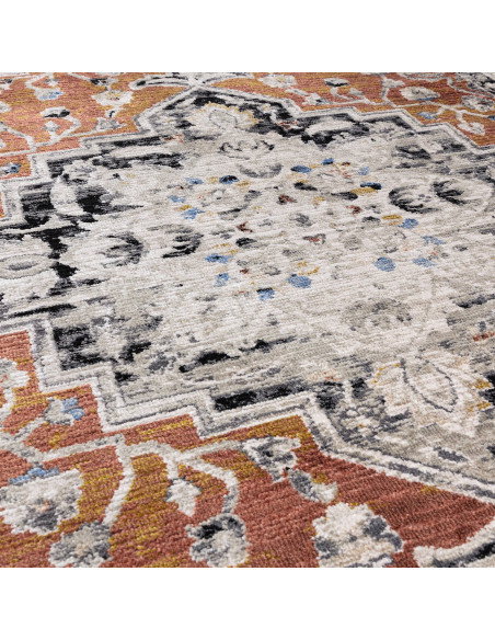 Elevate your décor with the Sovereign Terracotta Medallion classic rug, featuring a Persian pattern and durable, easy-care synt