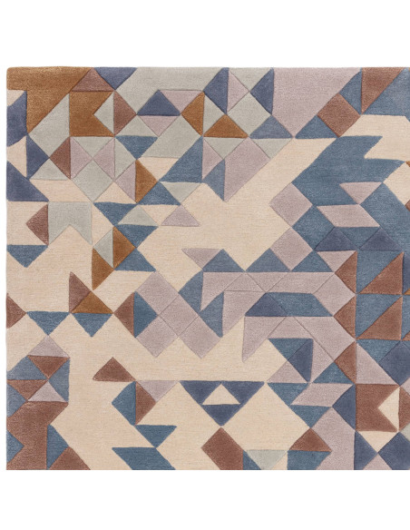 Elevate your space with the Enigma Blue Multi modern designer rug, featuring a plush geometric design in soft blues and warm ne