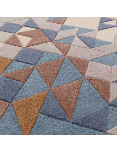 Elevate your space with the Enigma Blue Multi modern designer rug, featuring a plush geometric design in soft blues and warm ne