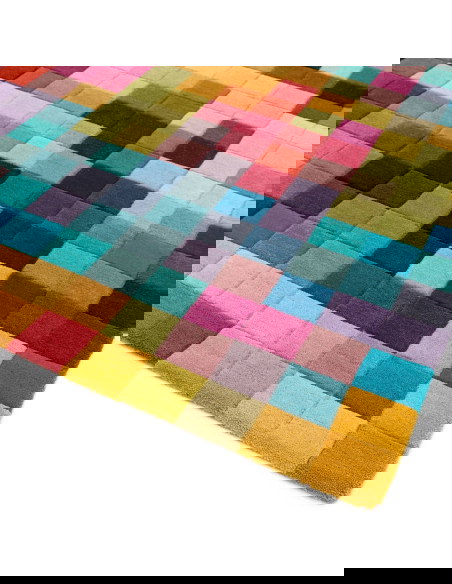 Add vibrant style and cozy comfort to your space with the Funk Multi modern area rug, featuring a bold geometric design and plu