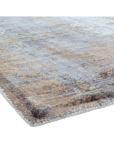 Elevate your space with the Gatsby Coral modern designer rug, featuring a soft abstract pattern and plush natural viscose for l