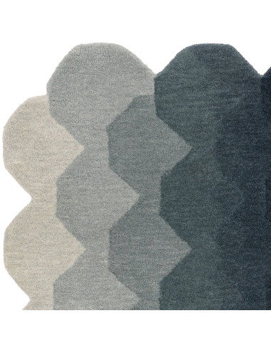 Elevate your space with the Hive Teal modern designer rug, featuring a geometric pattern and plush wool texture for timeless st