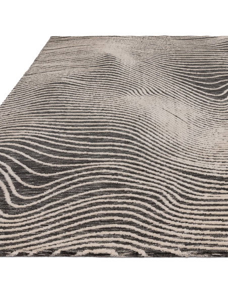Elevate your space with the Mason Magnitude Black, a modern designer rug featuring an abstract geometric pattern and durable, e
