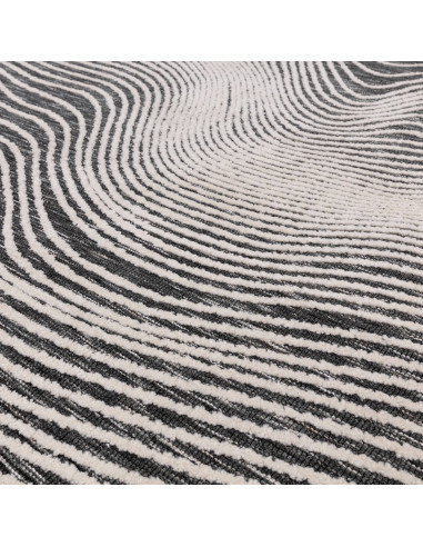 Elevate your space with the Mason Magnitude Black, a modern designer rug featuring an abstract geometric pattern and durable, e