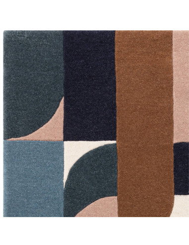 Elevate your home with the Matrix 89 Klotski Teal, a modern designer rug featuring bold geometric patterns and plush natural wo