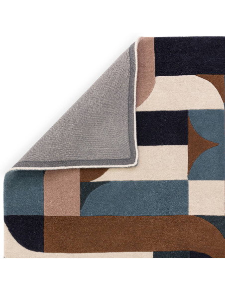 Elevate your home with the Matrix 89 Klotski Teal, a modern designer rug featuring bold geometric patterns and plush natural wo