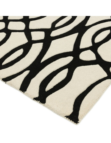 Discover the Matrix MAX35 Wire White, a modern designer rug with bold geometric patterns crafted from soft, durable natural woo