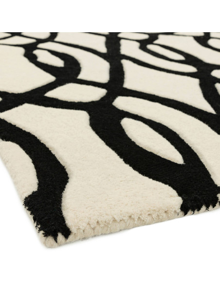Discover the Matrix MAX35 Wire White, a modern designer rug with bold geometric patterns crafted from soft, durable natural woo