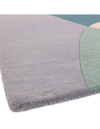 Elevate your home with the Matrix MAX56 Arc Sky, a modern designer rug featuring geometric elegance and plush natural wool for