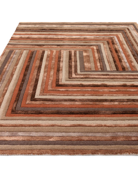 Elevate your space with the Matrix Network Terracotta, a modern designer rug featuring a plush geometric pattern in warm, invit