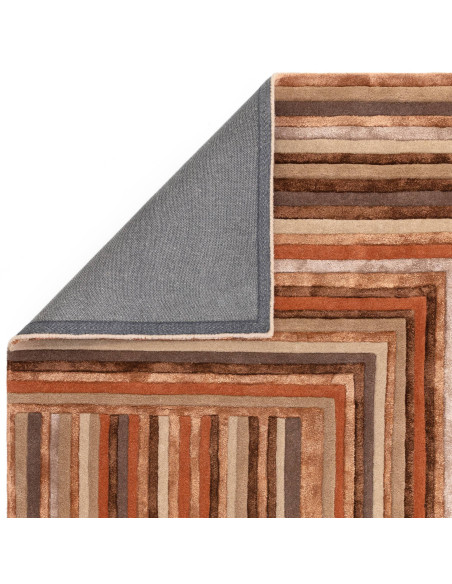 Elevate your space with the Matrix Network Terracotta, a modern designer rug featuring a plush geometric pattern in warm, invit
