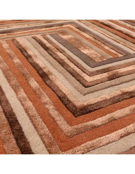 Elevate your space with the Matrix Network Terracotta, a modern designer rug featuring a plush geometric pattern in warm, invit