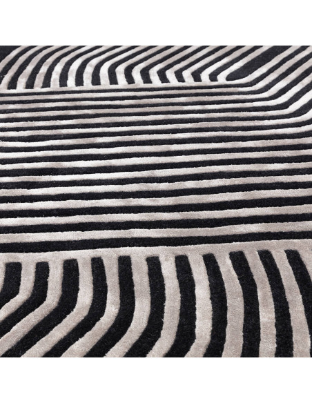 Elevate your space with the Matrix Solsitice Gunmetal, a modern designer rug featuring striking geometric patterns and luxuriou