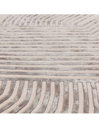 Elevate your space with the Matrix Solsitice Ivory, a modern designer rug featuring geometric elegance and a luxurious wool-vis