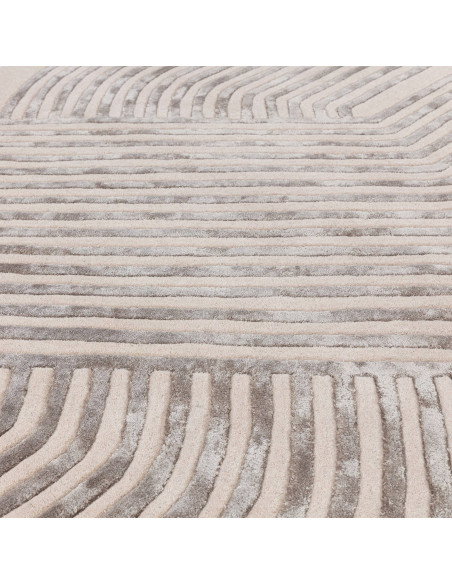 Elevate your space with the Matrix Solsitice Ivory, a modern designer rug featuring geometric elegance and a luxurious wool-vis