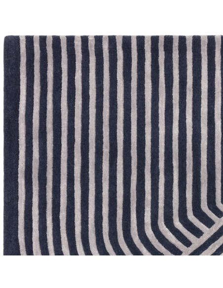 Elevate your space with the Matrix Solsitice Navy, a modern designer rug featuring bold geometric patterns and luxurious natura