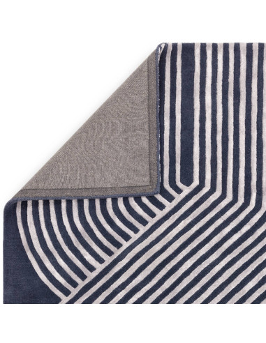 Elevate your space with the Matrix Solsitice Navy, a modern designer rug featuring bold geometric patterns and luxurious natura
