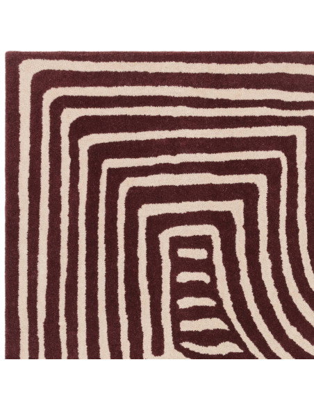 Elevate your space with the Reef RF29 Curve Plum, a modern designer rug featuring bold geometry and plush natural wool for last