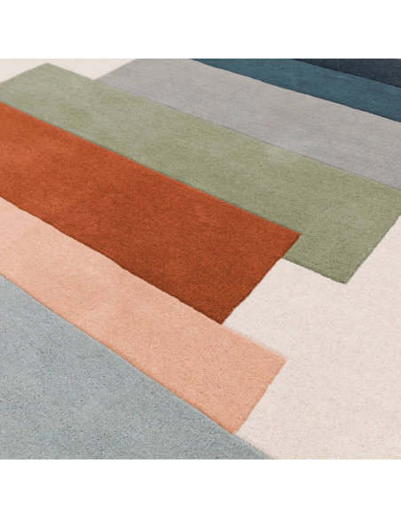 Elevate your space with the Reef RF32 Stacks Green, a modern designer rug featuring geometric elegance and plush natural wool f